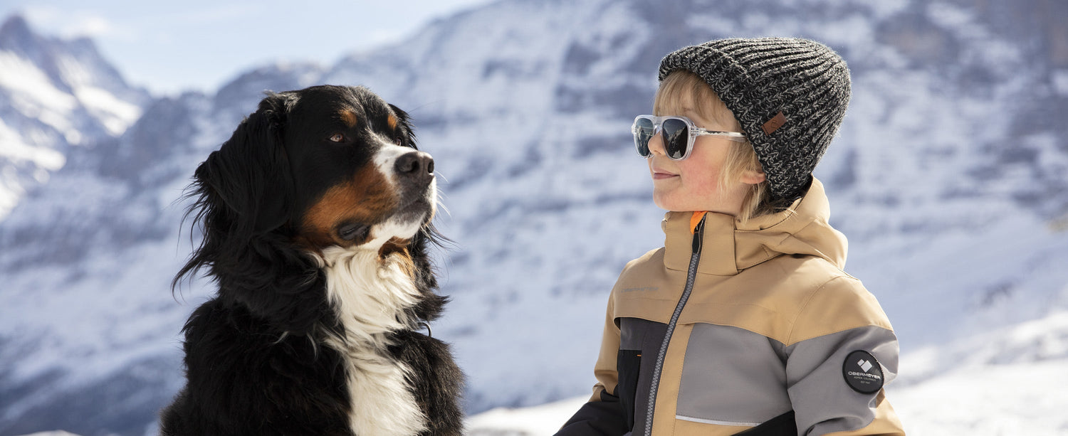 Boy in Obermeyer ski apparrel.