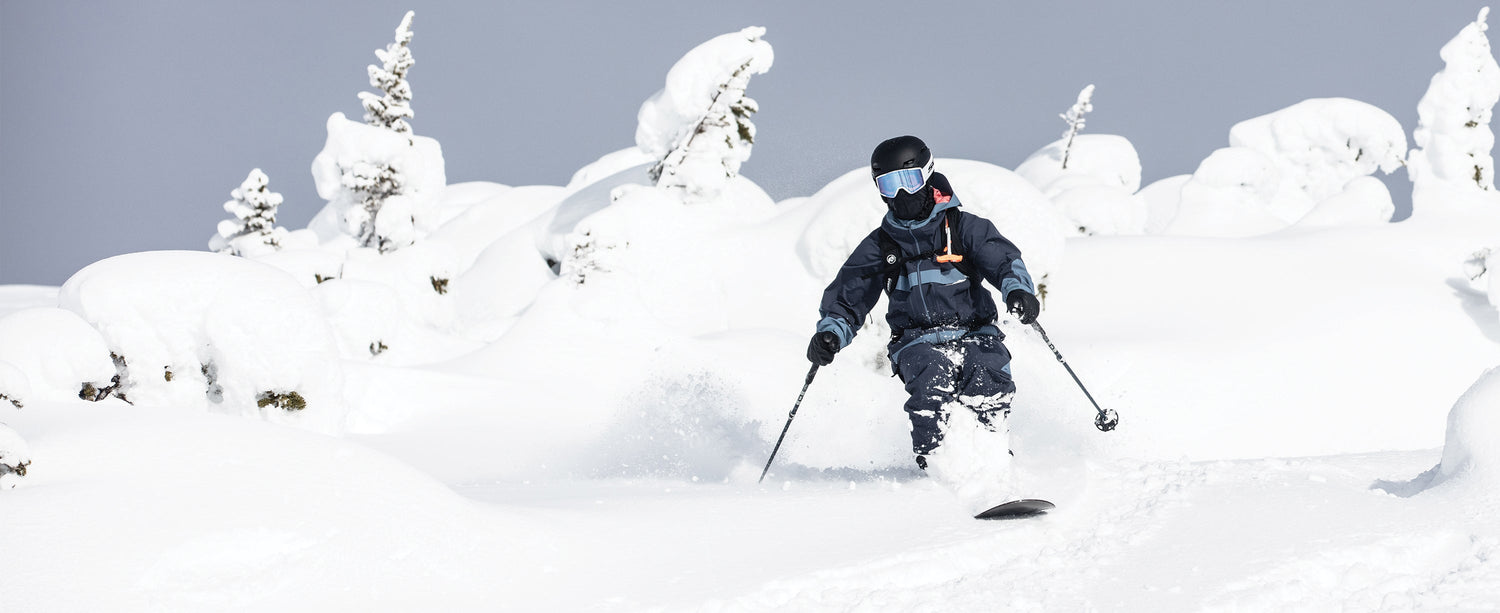 Male skier wearing an Obermeyer ski jacket.
