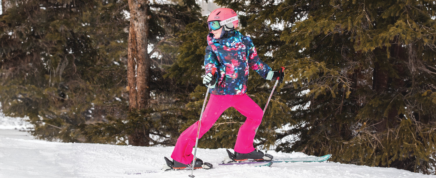 A teen girl skier wearing Obermeyer.