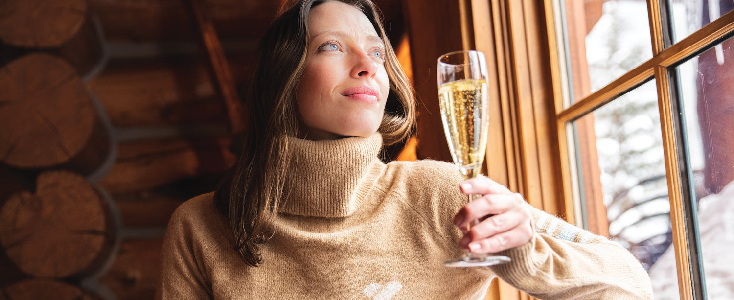 Female skier wearing an Obermeyer sweater.