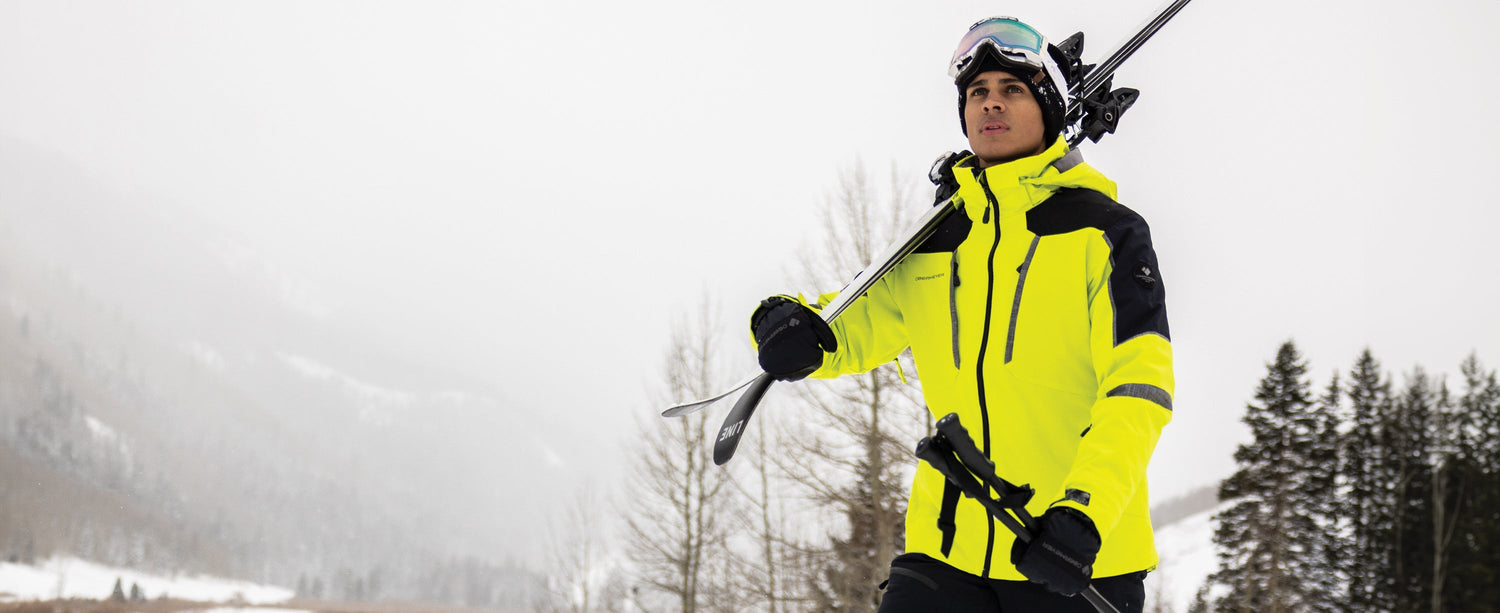 Male skier wearing Obermeyer gloves.